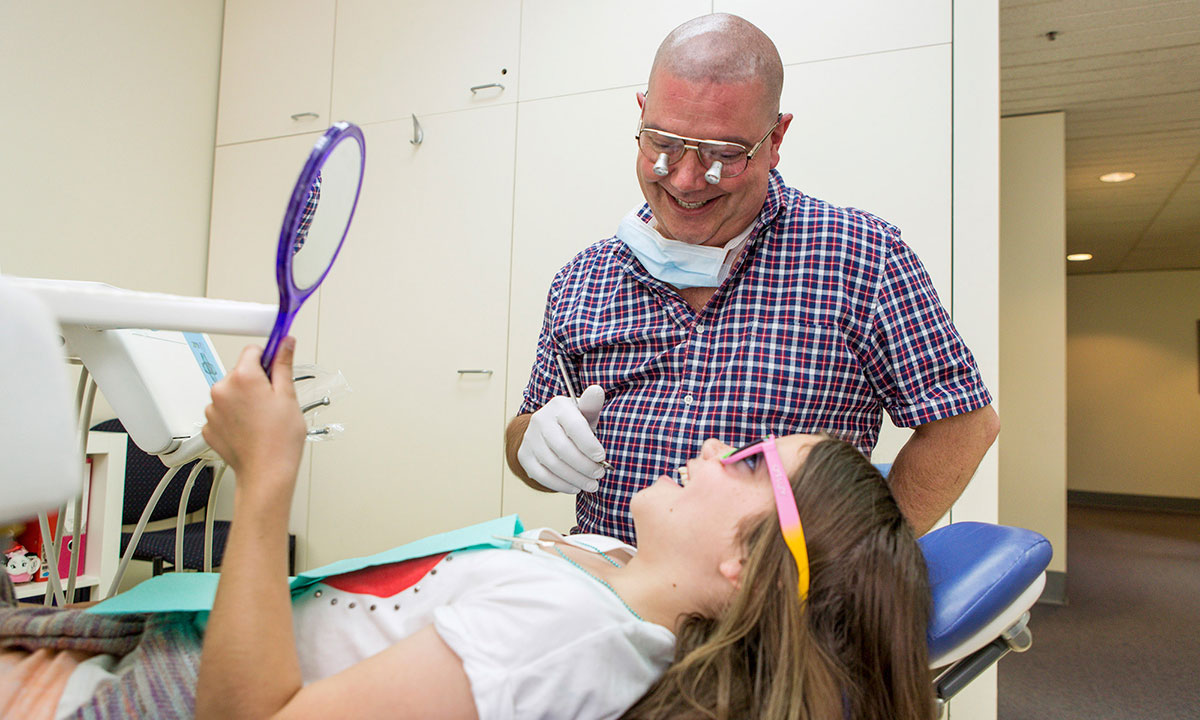 A child receiving children's dentistry services in Adelaide