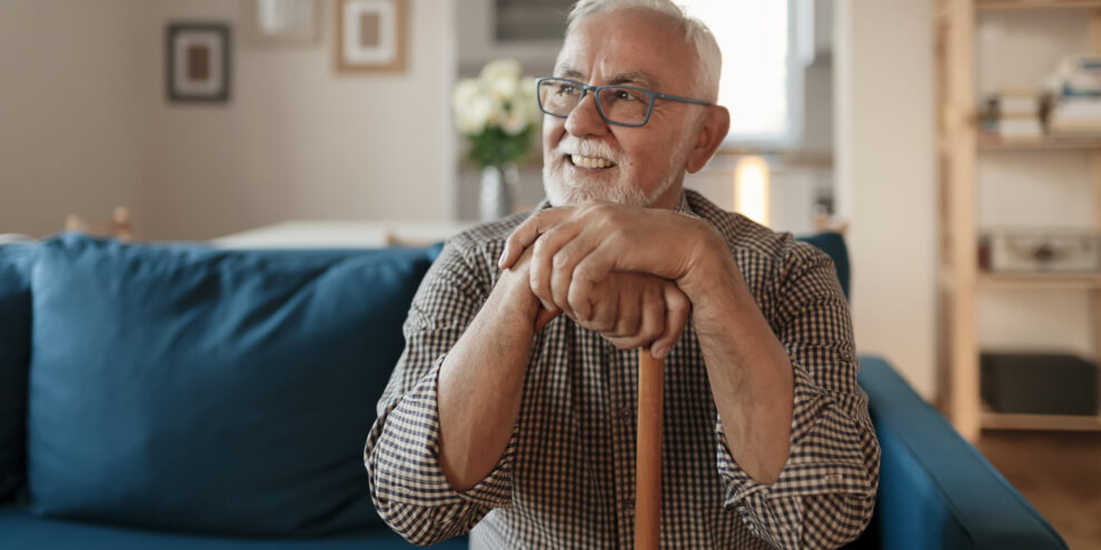 An older patient learning about dental care for pensioners and implant options at Adelaide DentalCare on Grenfell Street in the Adelaide CBD.
